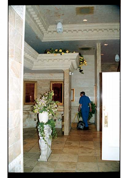 Men's room @ peppermill! Note departing greek deity.