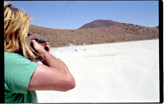 Blue hits elmo (note airborne elmo-pieces)