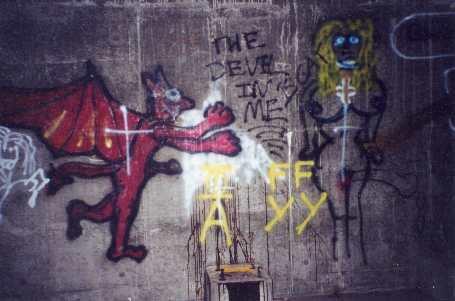 Graffiti, left over from when this place used to be wide open to the public in the 1980s.
