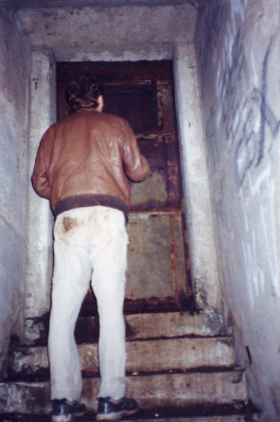 At one end of a long hallway, this sealed door led to the outside world.